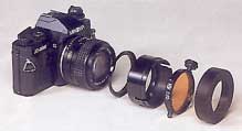 Camera with barrier filter cassette system