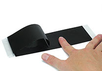 Afmeting van een Printake-vel in relatie tot een vinger.