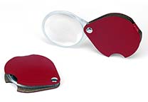 Pocket magnifier, magnification about 3 X. The diameter of the  (glass) lens is 45 mm.