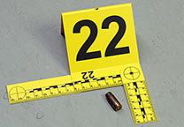 Evidence marker with cartridge case.